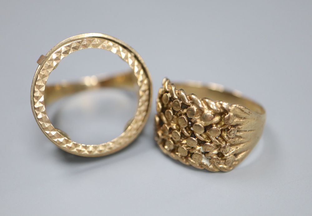 A 9ct gold gentlemans pierced and textured ring and a similar sovereign ring (with vacant mount), 11.9g